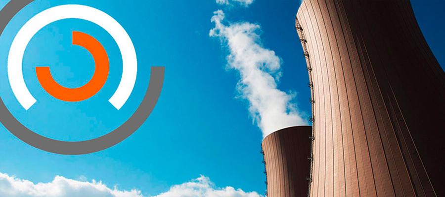 Cooling tower against blue sky